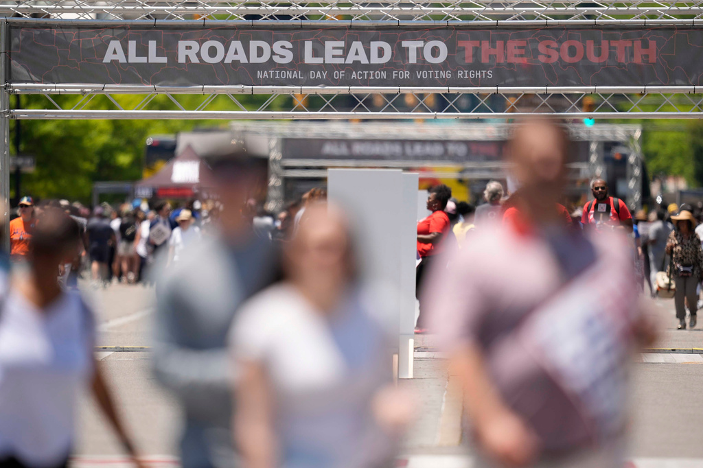 People gather during a voting rally, Saturday, May 16, 2026, in Montgomery, Ala. (AP Photo/Mike Stewart)