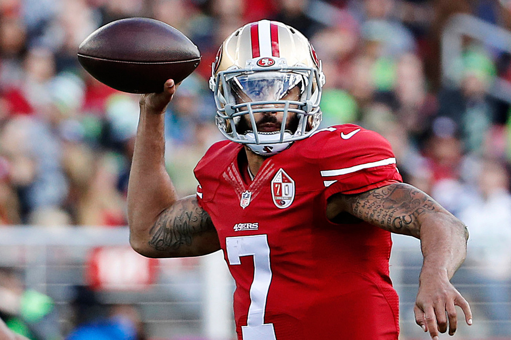 FILE - San Francisco 49ers quarterback Colin Kaepernick (7) throws a pass during the first half of an NFL football game against Seattle Seahawks in Santa Clara, Calif., Sunday, Jan. 1, 2017. (AP Photo/Tony Avelar, File9