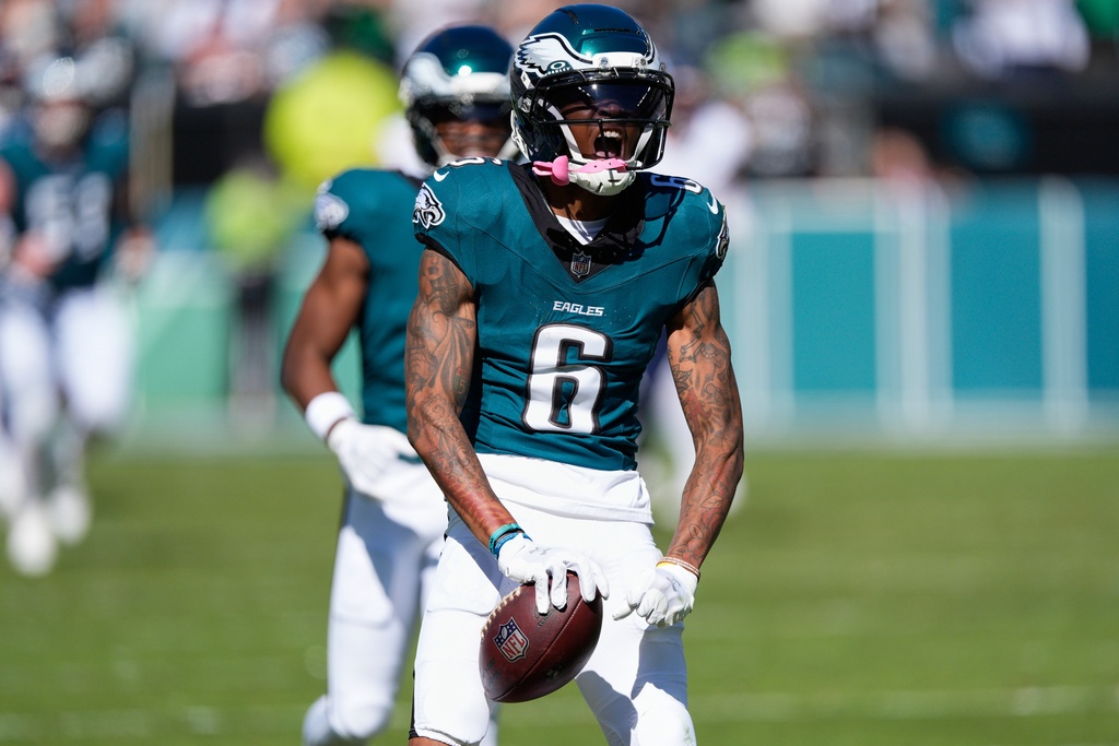 Philadelphia Eagles wide receiver Devonta Smith (6) reacts to a catch for a first down during the first half of an NFL football game against the Denver Broncos on Sunday, Oct. 5, 2025, in Philadelphia. (AP Photo/Chris Szagola)