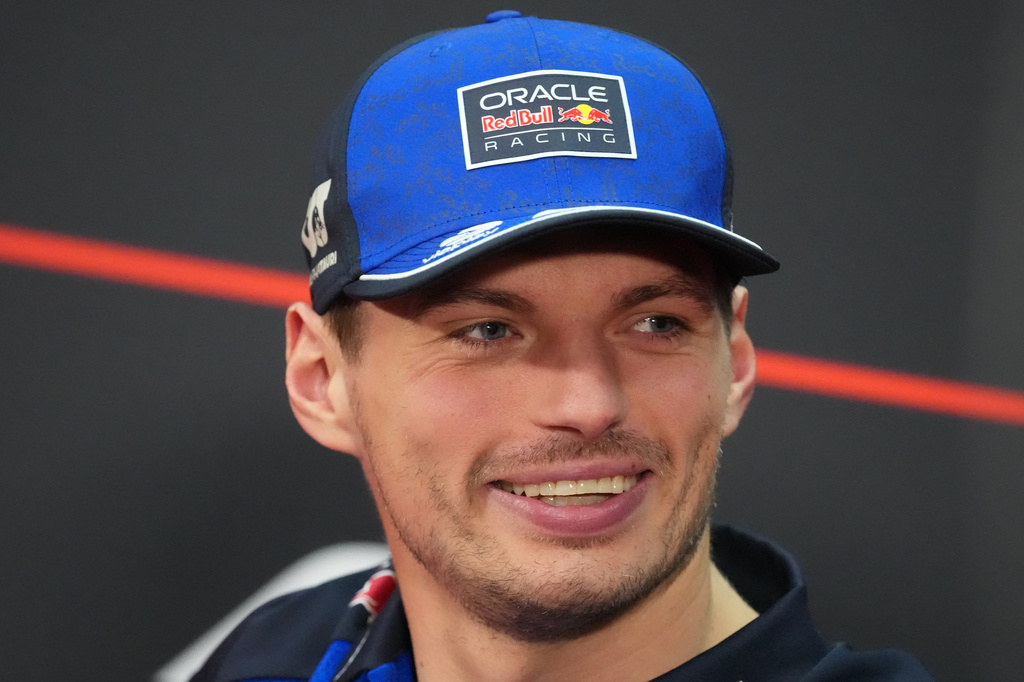 Red Bull driver Max Verstappen smiles during the drivers' press conference ahead of the Bahrain Grand Prix in Malaysia at the Sepang International Circuit in Sepang, Malaysia, Thursday, Oct. 1, 2026. (AP Photo/Aijaz Rahi)