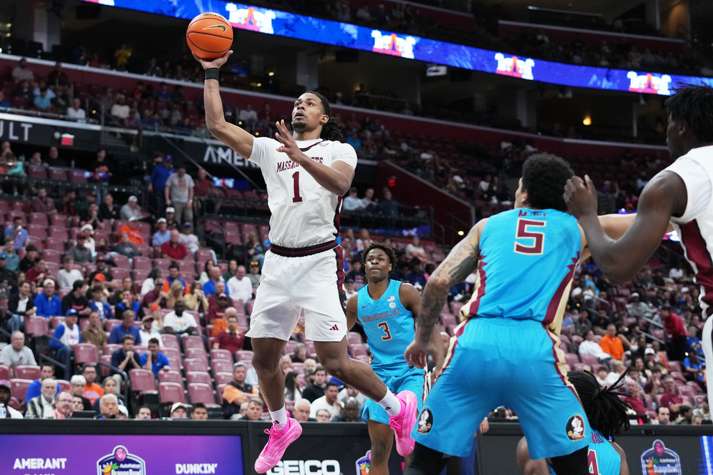 Massachusetts forward Daniel Hankins-Sanford goes to the basket during the second half of an NCAA college basketball game against Florida State at the Orange Bowl Basketball Classic, Saturday, Dec. 13, 2025, in Sunrise, Fla. (AP Photo/Lynne Sladky)