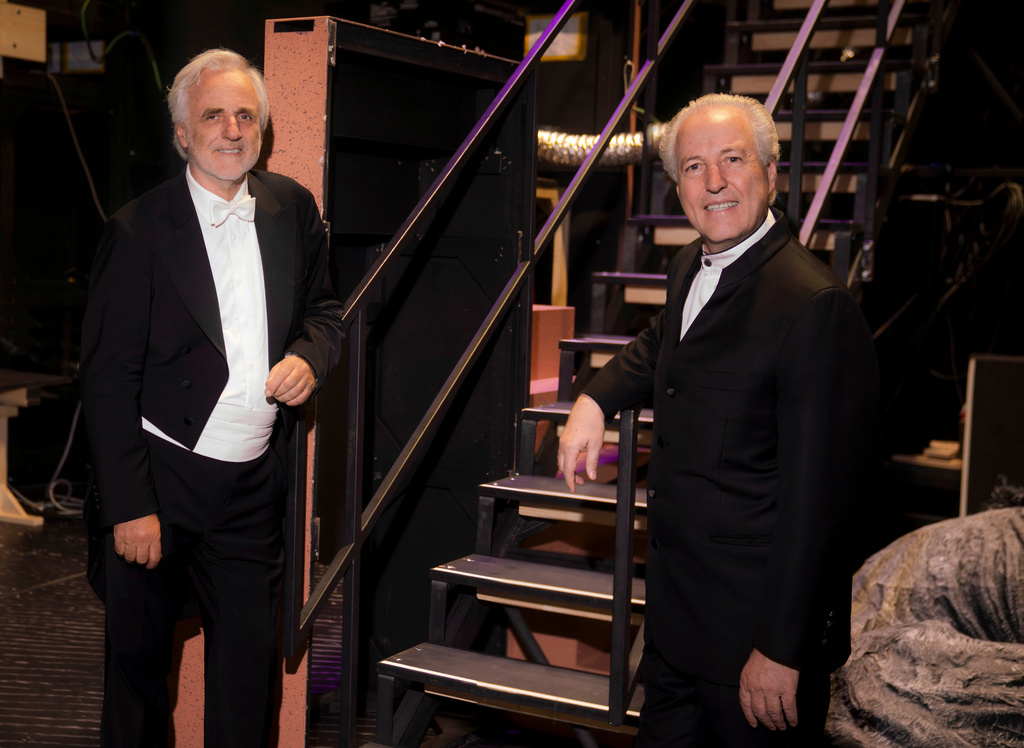 Manfred Honeck, conductor of the Vienna Philharmonic Orchestra and music director of the Pittsburgh Symphony Orchestra, right, appears with his brother Rainer Honeck, concertmaster of the Vienna Philharmonic Orchestra, as the two worked together on a production of Richard Strauss’ “Ariadne auf Naxos" at the Salzburg Festival in Salzburg, Austria on Aug. 7, 2026. (Marco Borrelli/Salzburg Festival via AP)