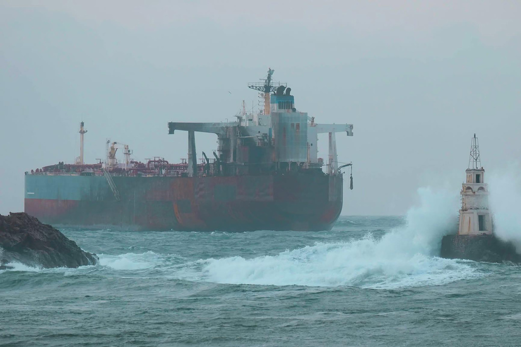 The oil tanker Kairos stranded off near the Black Sea port of Ahtopol, Bulgaria, Saturday, Dec. 6, 2025, after an alleged Ukrainian drone attack. (AP Photo/ Zdravko Vassilev)
