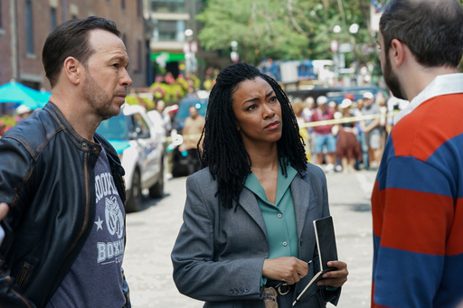 This image released by CBS shows Donnie Wahlberg, left, and Sonequa Martin-Green in a scene from "Boston Blue." (John Medland/CBS via AP) This image released by CBS shows Donnie Wahlberg, left, and Sonequa Martin-Green in a scene from "Boston Blue." (John Medland/CBS via AP)