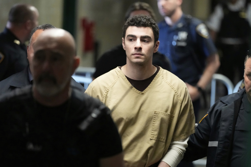 Luigi Mangione is escorted into Manhattan state court in New York, Tuesday, Sept. 16, 2025. (AP Photo/Seth Wenig)