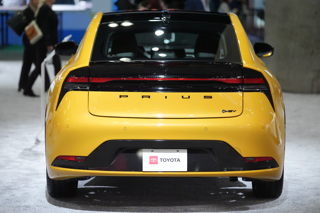 The 2026 Toyota Prius hybrid electric vehicle (HEV) is showcased at the LA Auto Show in Los Angeles Thursday, Nov. 20, 2025. (AP Photo/Damian Dovarganes)