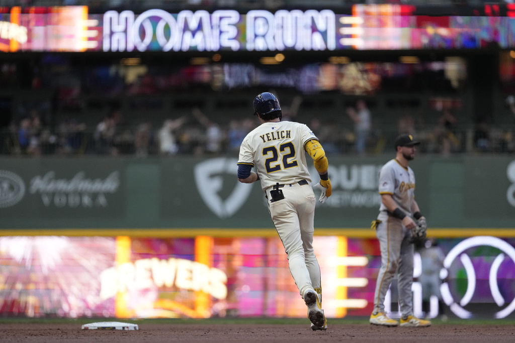 Milwaukee Brewers' Christian Yelich rounds the bases after hitting a solo home run during the third inning of a baseball game against the Pittsburgh Pirates, Monday, Aug. 11, 2025, in Milwaukee. (AP Photo/Aaron Gash)