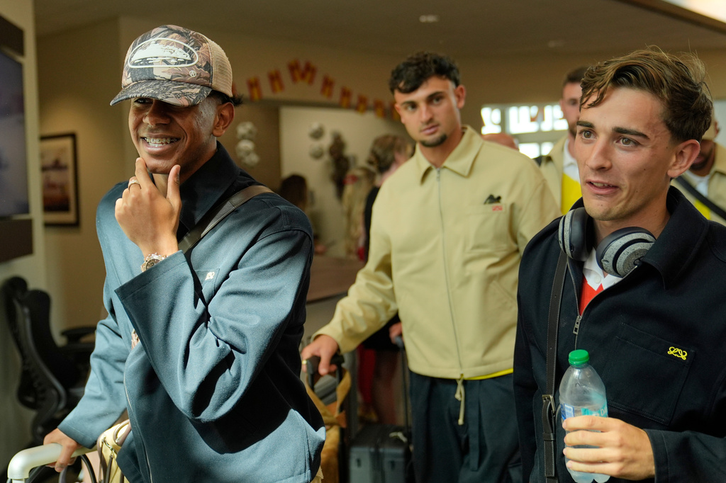 Spain forward Lamine Yamal, left, and defender Marc Pubill, center, and midfielder Gavi, right, with teammates for the World Cup soccer tournament Friday, June 5, 2026, in Chattanooga, Tenn. (AP Photo/George Walker IV)
