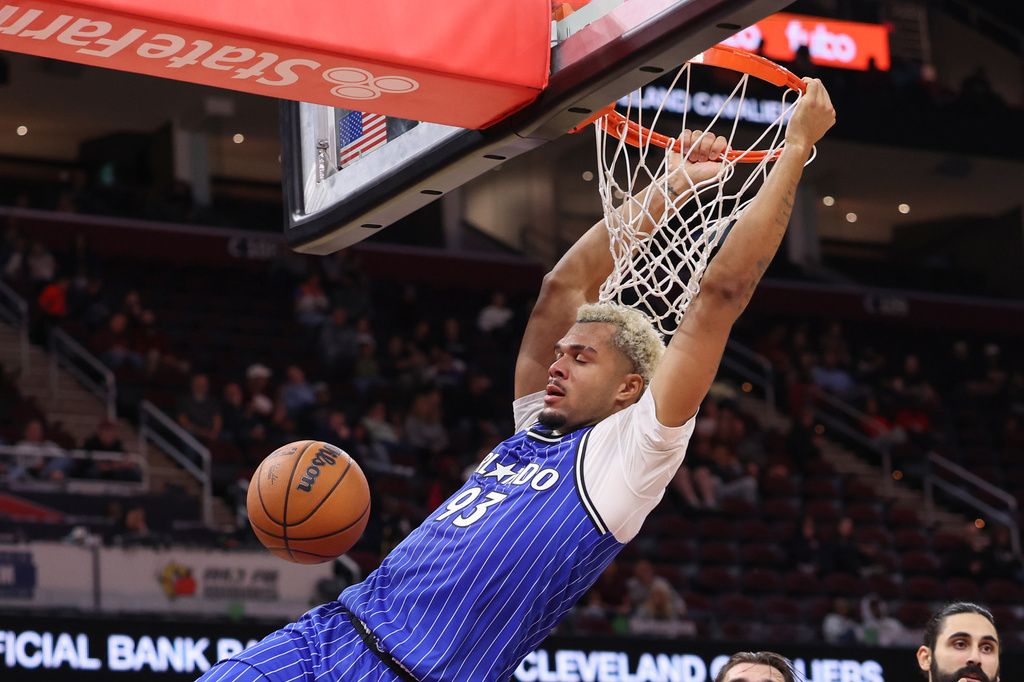 Orlando Magic forward Noah Penda (93) finishes a dunk against the Cleveland Cavaliers during a preseason NBA basketball game in Cleveland, Sunday, Oct. 11, 2026. (AP Photo/Tim Phillis)