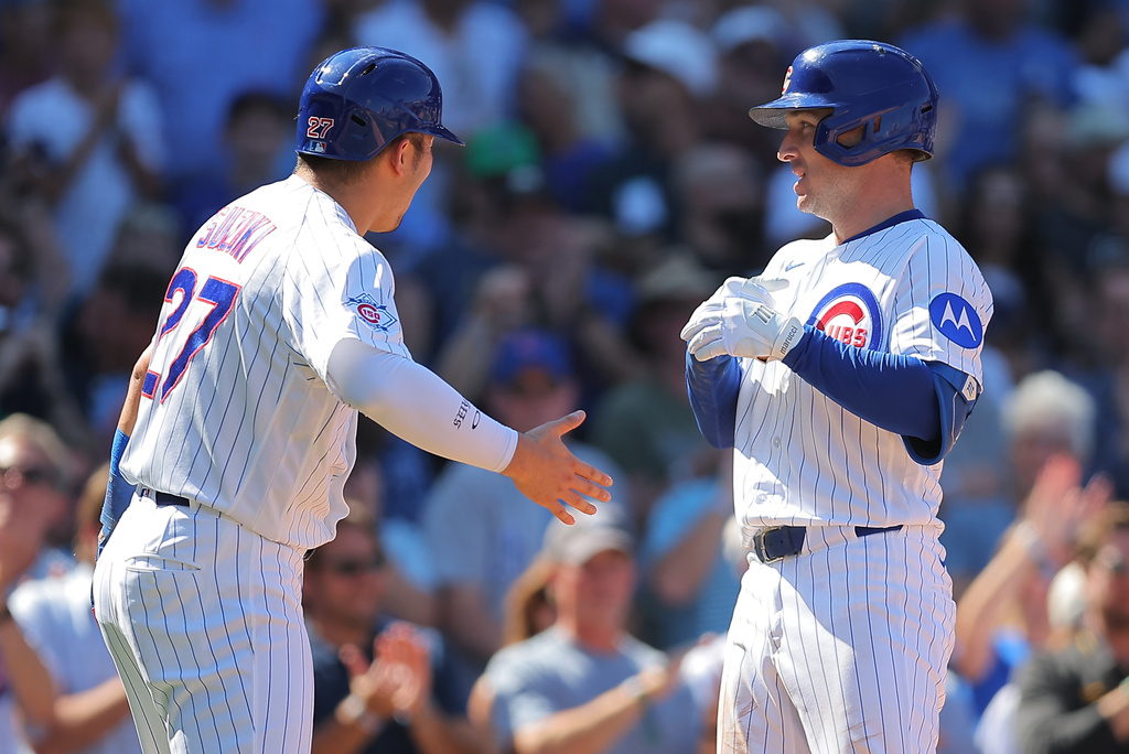 Chicago Cubs' Alex Bregman, right, celebrates his two-run home run with Seiya Suzuki, left, during the fourth inning of a baseball game against the Pittsburgh Pirates, Friday, Sept. 11, 2026, in Chicago. (AP Photo/Melissa Tamez)
