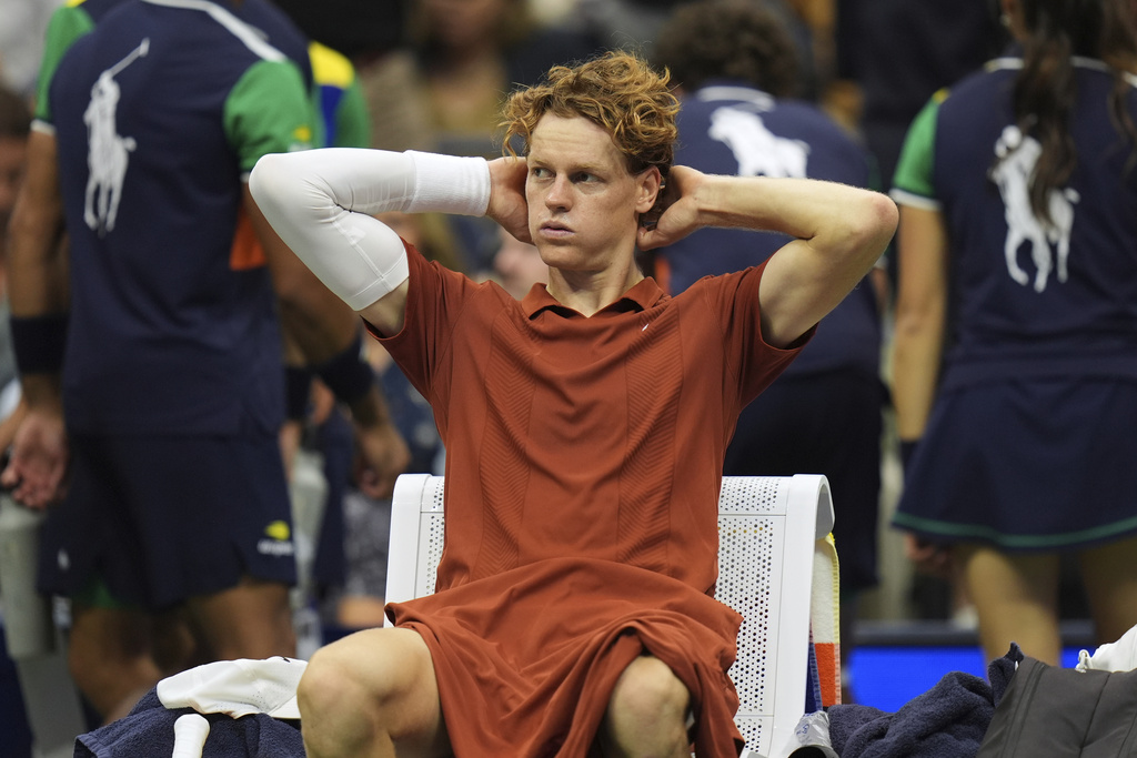 Jannik Sinner, of Italy, sits between sets during the men's singles final of the U.S. Open tennis championships against Carlos Alcaraz, of Spain, Sunday, Sept. 7, 2025, in New York. (AP Photo/Seth Wenig)