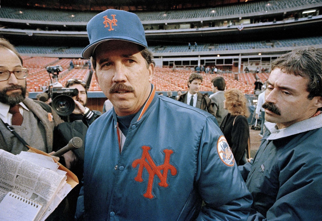 FILE - New York Mets Manager Davey Johnson talks with reporters prior to the opening game of the World Series between the Mets and the Boston Red Sox at Shea Stadium in New York, Oct. 18, 1986. (AP Photo/Paul Bemoit, File)