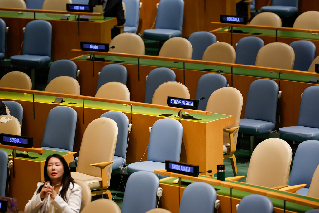 Palestinian delegate seats sit empty along with others as Israeli Prime Minister Benjamin Netanyahu speaks during the 80th session of the United Nations General Assembly, Friday, Sept. 26, 2025, at U.N. headquarters. (AP Photo/Stefan Jeremiah)