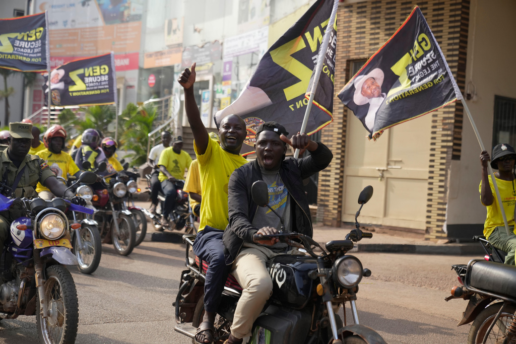 Supporters of Ugandan President Yoweri Museveni celebrate his victory in the presidential election in Kampala, Uganda, Saturday, Jan. 17, 2026. (AP Photo/Brian Inganga)