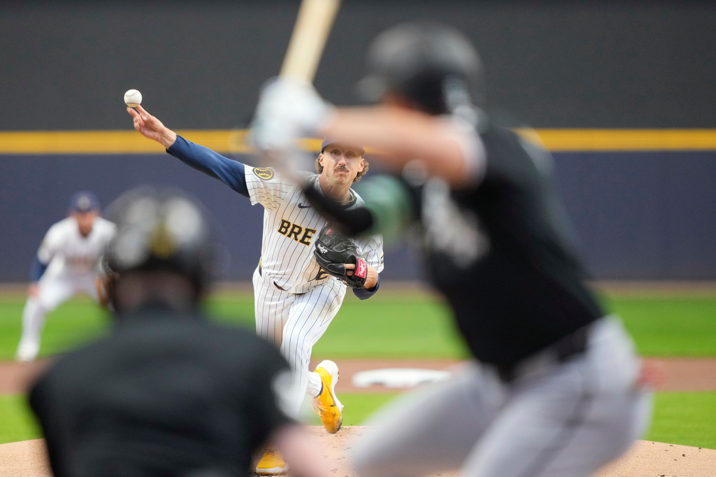 Milwaukee Brewers pitcher Brandon Sproat throws during the first inning of a baseball game against the Chicago White Sox, Sunday, March 29, 2026, in Milwaukee. (AP Photo/Kayla Wolf)