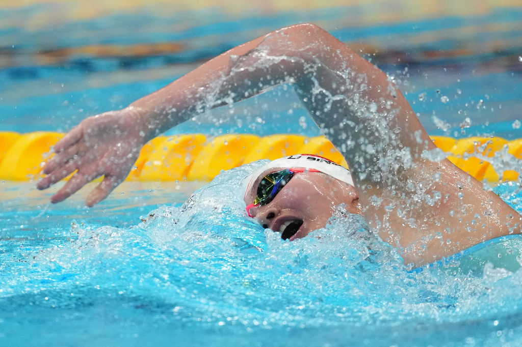 Li Bingjie of China competes in the women's 400-meter freestyle final in swimming at the Asian Games in Tokyo, Sept. 22, 2026. (AP Photo/Hiro Komae)