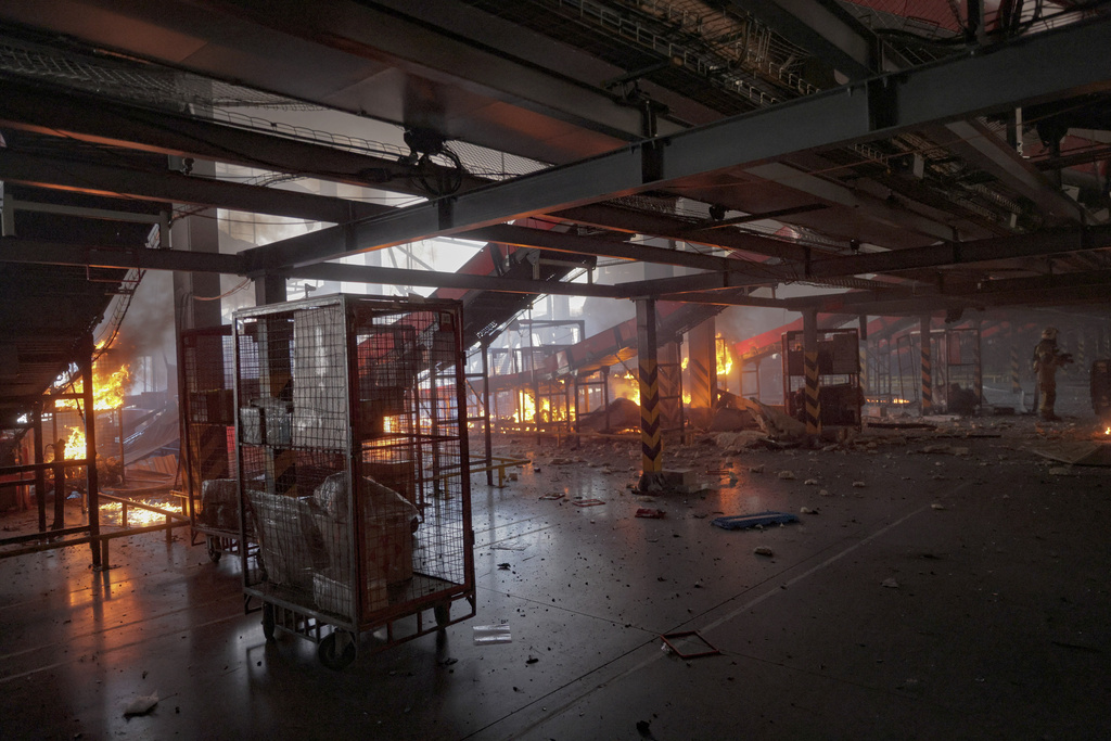A Nova Poshta postal warehouse is destroyed following Russian air attack on the outskirts of Kharkiv, Ukraine, Sunday, Aug. 2, 2026. (AP Photo/Yevhen Titov)
