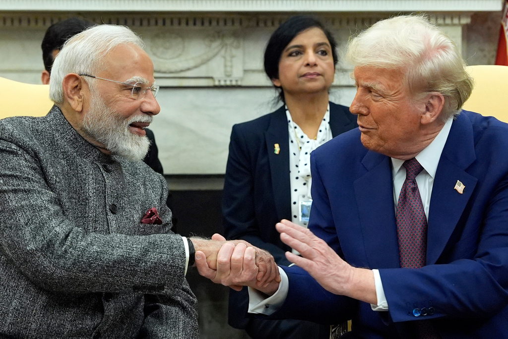FILE -President Donald Trump shakes hands with India's Prime Minister Narendra Modi in the Oval Office of the White House, Feb. 13, 2025, in Washington. (Photo/Alex Brandon, File)