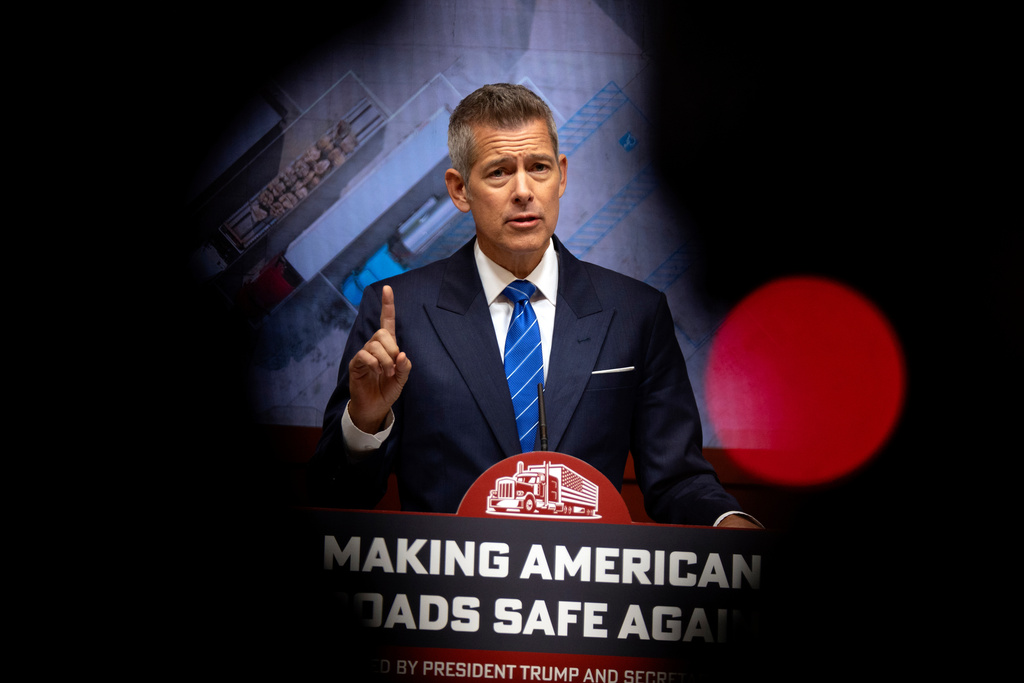 Transportation Secretary Sean Duffy speaks during a news conference at the Department of Transportation in Washington, Friday, Dec. 12, 2025. (AP Photo/Mark Schiefelbein)