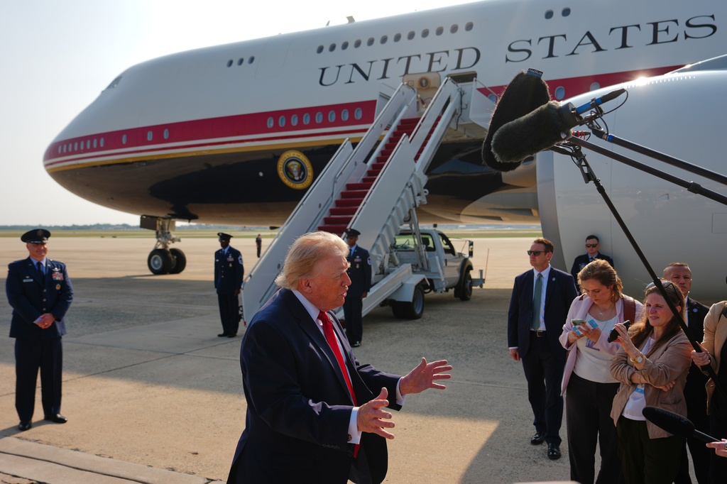 President Donald Trump speaks to reporters before boarding Air Force One, Wednesday, July 1, 2026, at Joint Base Andrews, Md. (AP Photo/Julia Demaree Nikhinson)