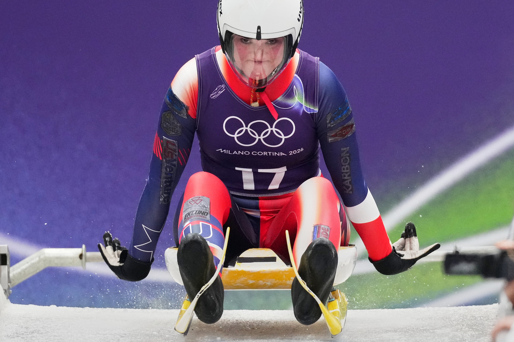 USA's Summer Britcher starts for a women's Luge training session at the 2026 Winter Olympics, in Cortina d'Ampezzo, Italy, Thursday, Feb. 5, 2026. (AP Photo/Alessandra Tarantino)