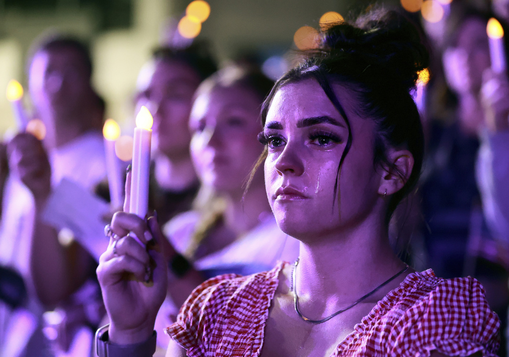 Tears stream down Alexa Maliwauki's face as she attends a Vigil for Unity at the UCCU Center at Utah Valley University in Orem on Friday, Sept. 19, 2025. Charlie Kirk, conservative activist and the founder and president of Turning Point USA, was fatally shot while answering questions at his American Comeback Tour at UVU on Sept. 10. (Kristin Murphy/The Deseret News via AP)