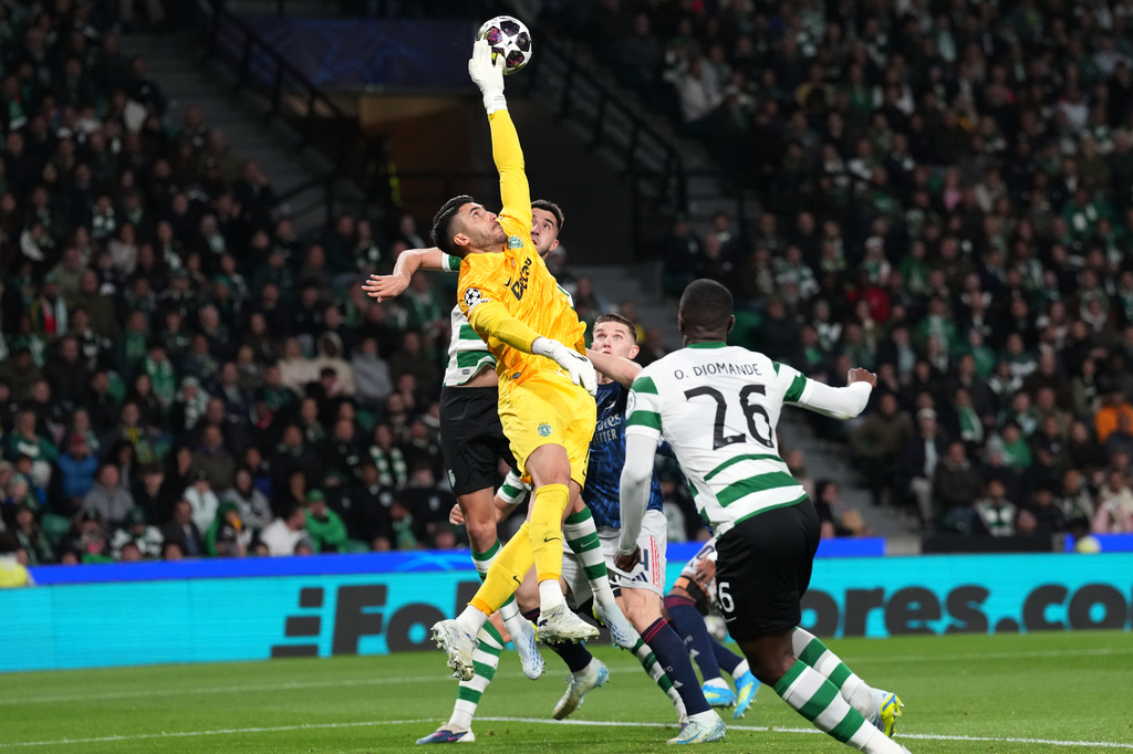 Sporting's goalkeeper Rui Silva makes a save during the Champions League quarterfinals, first leg, soccer match between Sporting CP and Arsenal, in Lisbon, Tuesday, April 7, 2026. (AP Photo/Armando Franca)