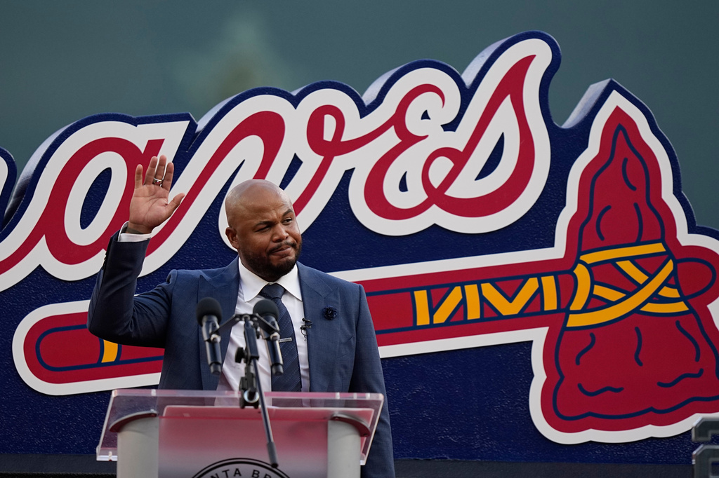 FILE - Former Atlanta Braves player Andruw Jones waves to the crowd as he is honored, Saturday, Sept. 9, 2023, in Atlanta. (AP Photo/Brynn Anderson, File)