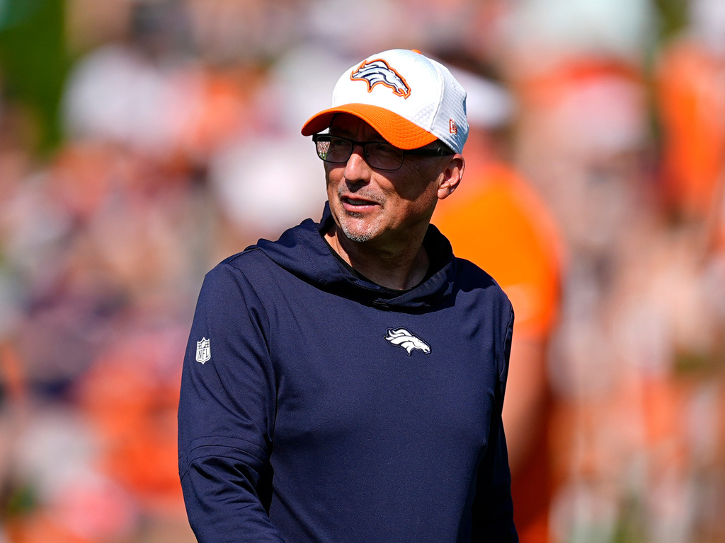 FILE - Denver Broncos senior offensive assistant Pete Carmichael looks on at an NFL football training camp Friday, Aug. 2, 2024, at the team's headquarters in Centennial, Colo. (AP Photo/David Zalubowski, File)