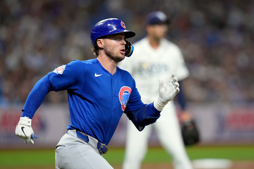 Chicago Cubs' Nico Hoerner runs the bases after his RBI double off Tampa Bay Rays pitcher Joe Boyle during the fifth inning of a baseball game Wednesday, April 8, 2026, in St. Petersburg, Fla. (AP Photo/Chris O'Meara)