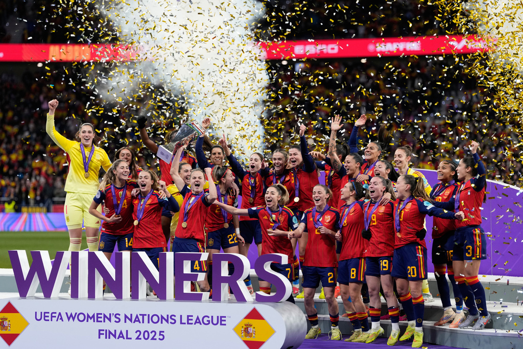 Spain's team captain Irene Paredes lifts the trophy after winning the Women's Nations League final soccer match between Spain and Germany in Madrid, Tuesday, Dec. 2, 2025. (AP Photo/Bernat Armangue)