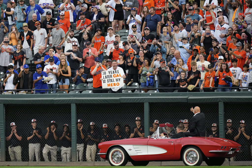 Former Baltimore Oriole Cal Ripken Jr. is honored during a ceremony commemorating the 30-year anniversary of setting the record for most consecutive games played in the MLB, before a baseball game between the Orioles and the Los Angeles Dodgers, Saturday, Sept. 6, 2025, in Baltimore. (AP Photo/Stephanie Scarbrough)