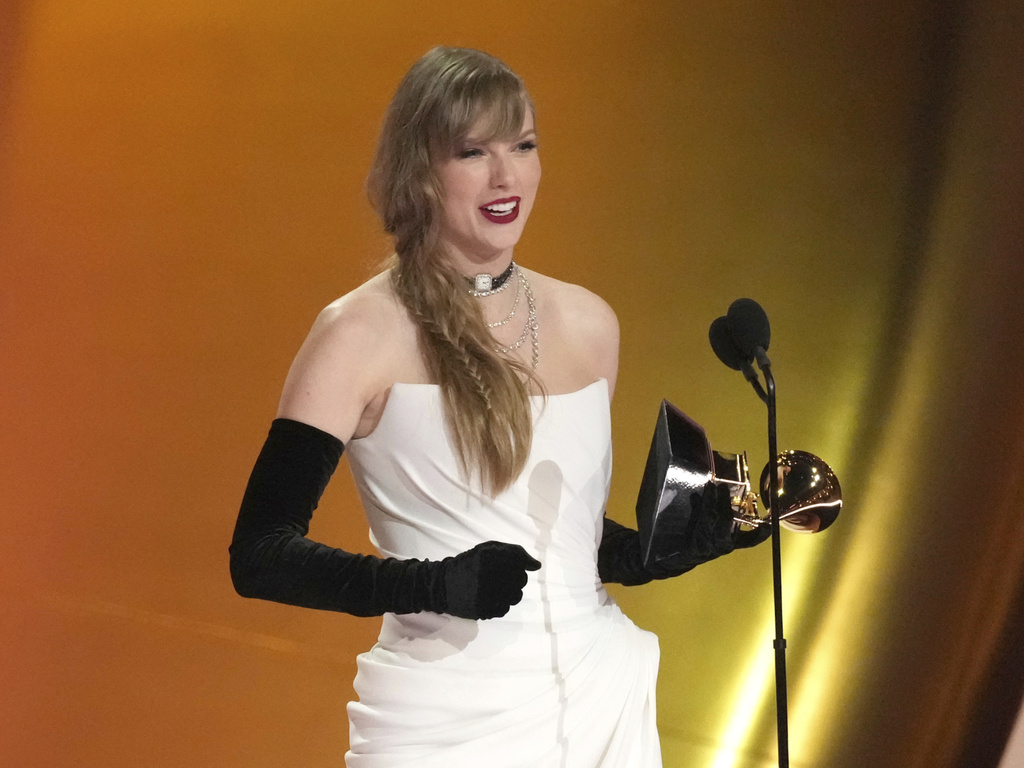 FILE - Taylor Swift accepts the award for best pop vocal album for "Midnights" during the 66th annual Grammy Awards on Feb. 4, 2024, in Los Angeles. (AP Photo/Chris Pizzello, File)