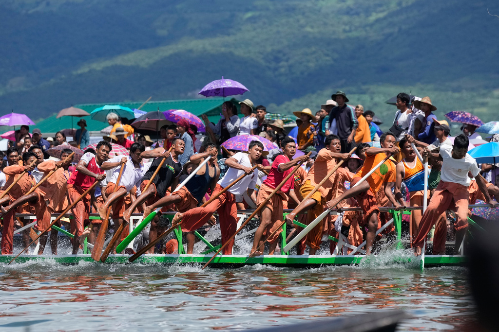 Intha ethnic people row their boats duringa traditional boats racing competition to mark the Phaung Daw Oo pagoda festival Friday, Sept. 26, 2025, in Inle Lake, southern Shan State, Myanmar. (AP Photo/Thein Zaw)