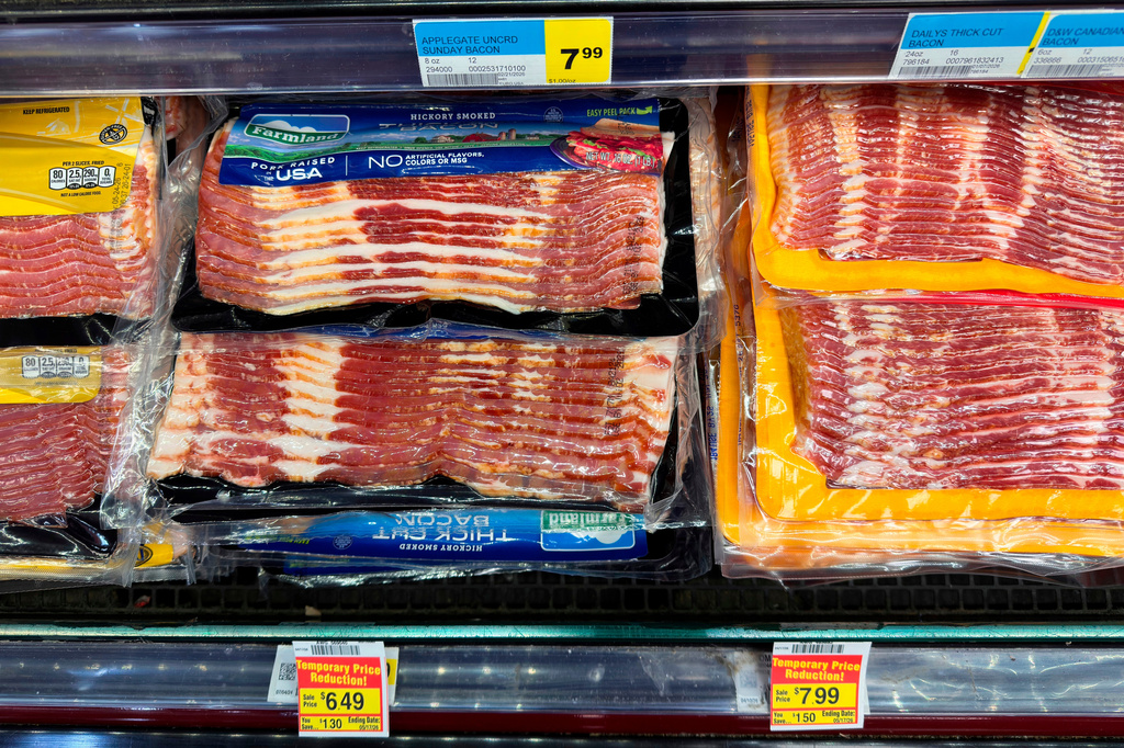 FILE - Bacon is displayed for sale at a grocery store Wednesday, April 29, 2026, in Chicago. (AP Photo/Erin Hooley, File)