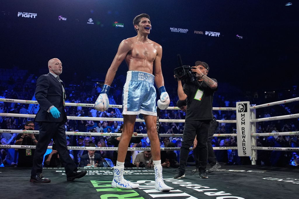 Sebastian Fundora celebrates after defeating Keith Thurman in a super welterweight championship boxing match Saturday, March 28, 2026, in Las Vegas. (AP Photo/John Locher)