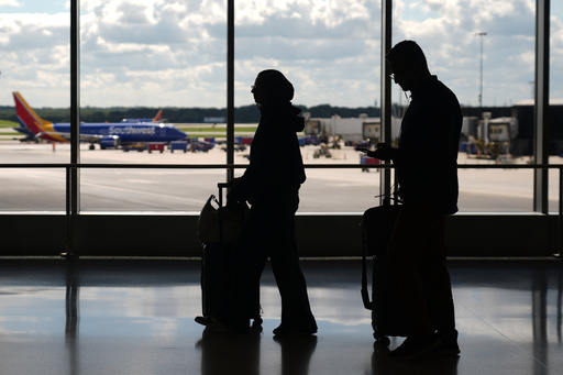 Travelers walk through the Baltimore/Washington International Thurgood Marshall Airport, Thursday, Oct. 2, 2025, in Baltimore. (AP Photo/Stephanie Scarbrough) Travelers walk through the Baltimore/Washington International Thurgood Marshall Airport, Thursday, Oct. 2, 2025, in Baltimore. (AP Photo/Stephanie Scarbrough)