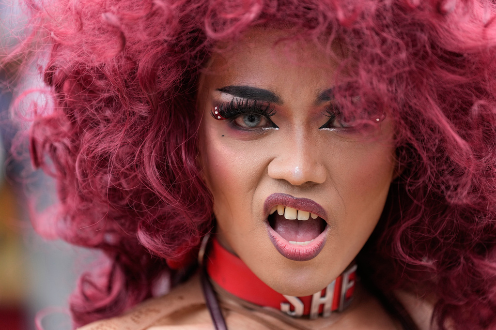 A performer dances during a Pride rally in Manila, Philippines on Friday, June 26, 2026. (AP Photo/Aaron Favila)