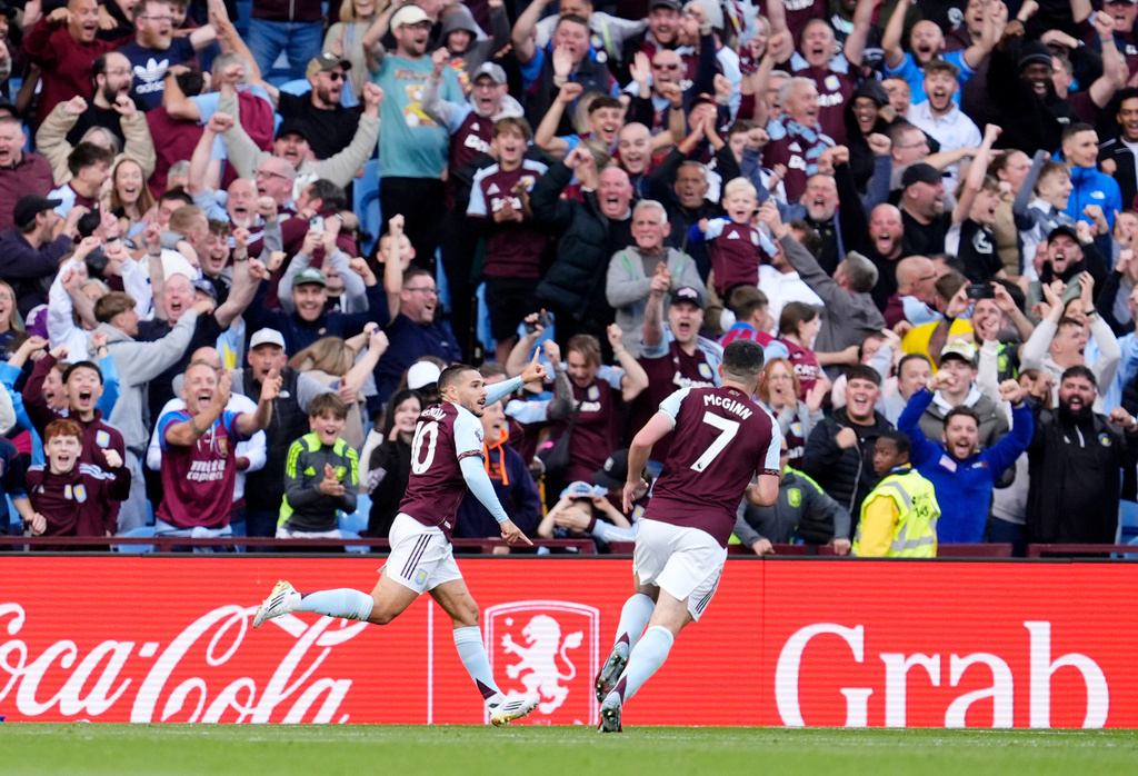 Aston Villa's Emi Buendia celebrates scoring their side's third goal of the game during the English Premier League soccer match between Aston Villa and Fulham at Villa Park, Birmingham, England, Sunday, Sept. 28, 2025. (Jacob King/PA via AP)