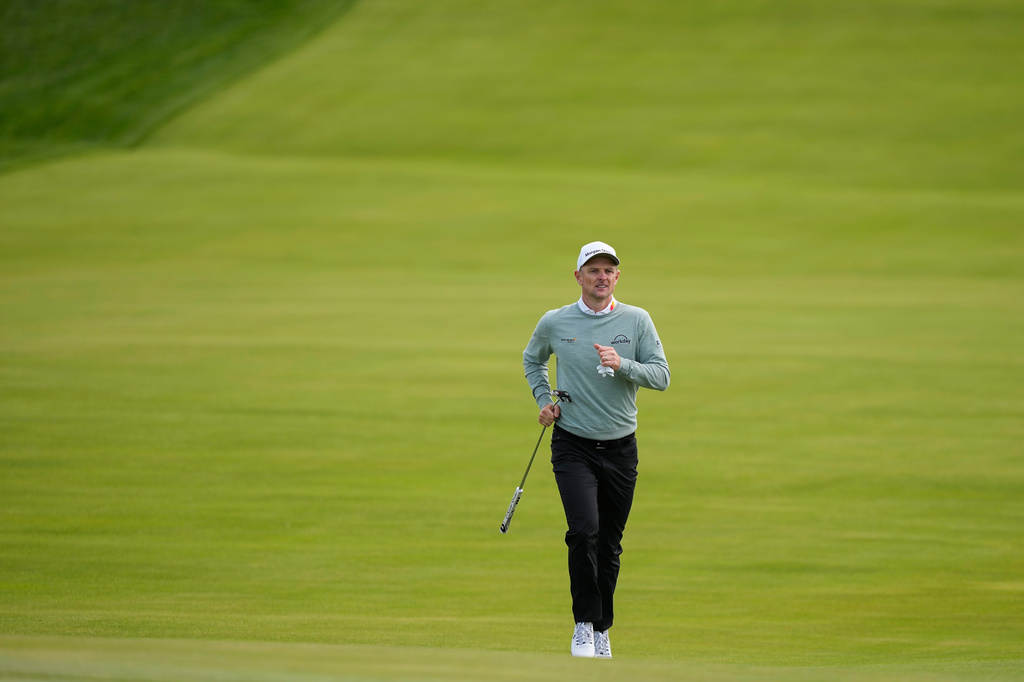 Justin Rose, of England, runs up the 10th fairway during the second round of the PGA Championship golf tournament at Aronimink Golf Club, Friday, May 15, 2026, in Newtown Square, PA. (AP Photo/Matt Slocum)