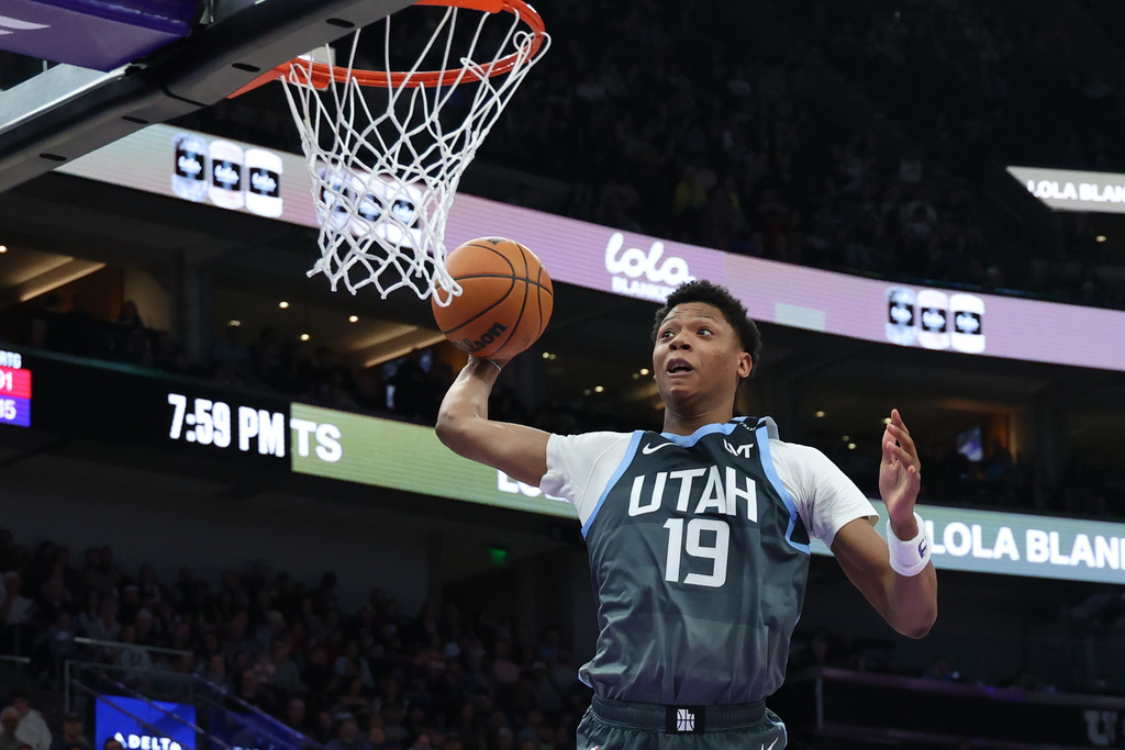 Utah Jazz guard Ace Bailey goes up for a dunk against the Toronto Raptors during the first half of an NBA basketball game, Monday, March 23, 2026, in Salt Lake City. (AP Photo/Rob Gray)