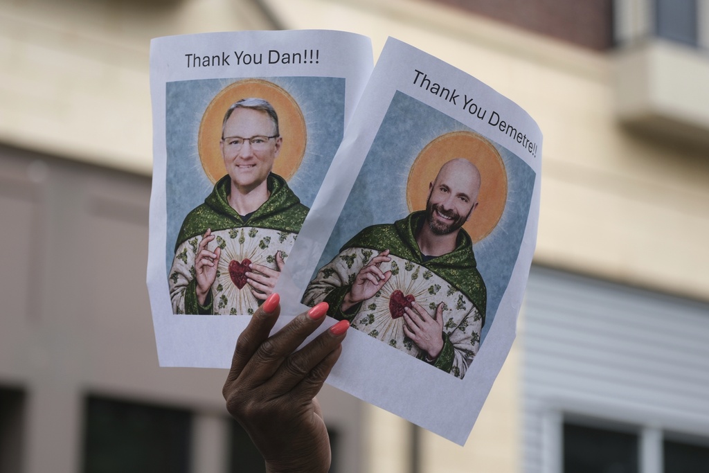 Workers and supporters gather to rally for departing scientific leaders at the Centers for Disease Control and Prevention outside the CDC headquarters, Thursday, Aug. 28, 2025, in Atlanta. (AP Photo/Ben Gray)