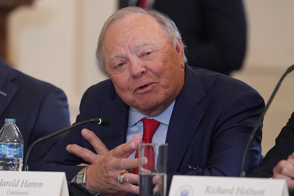Harold Hamm, founder and chairman of Continental Resources, speaks during a meeting with President Donald Trump and oil executives in the East Room of the White House, Friday, Jan. 9, 2026, in Washington. (AP Photo/Evan Vucci)
