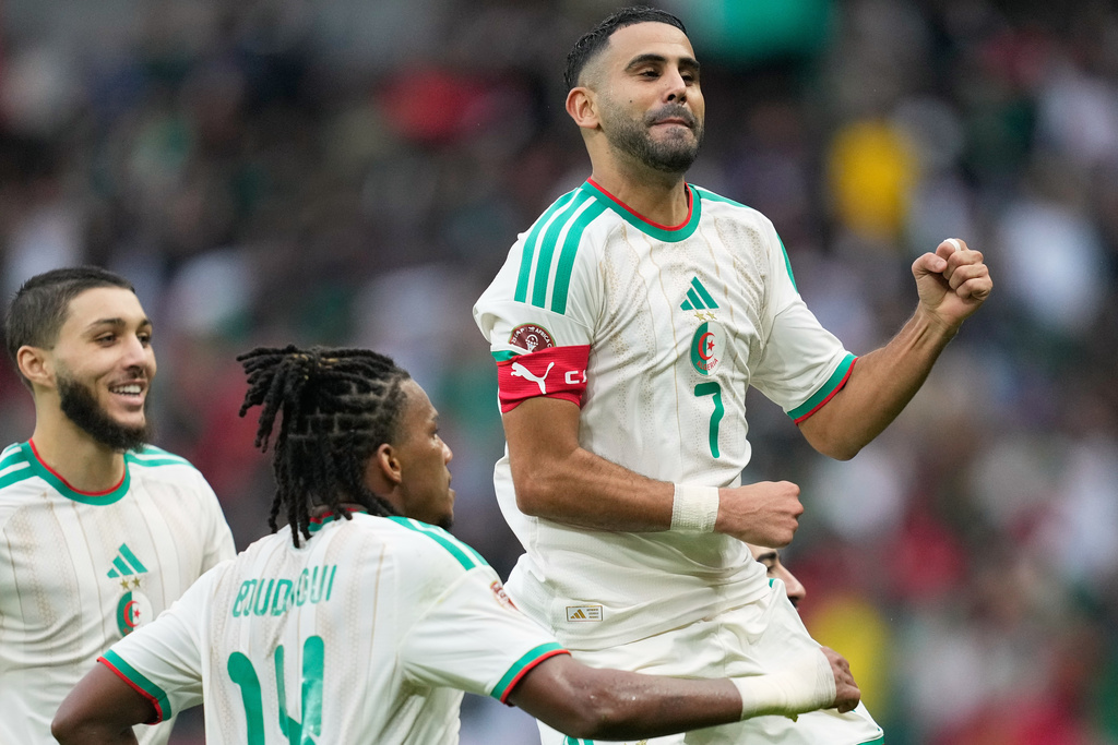 Algeria's Riyad Mahrez celebrates after scoring his side's second goal during the Africa Cup of Nations group E soccer match between Algeria and Sudan in Rabat, Morocco, Wednesday, Dec. 24, 2025. (AP Photo/Mosa'ab Elshamy)