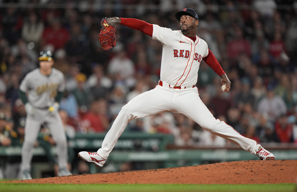 Boston Red Sox pitcher Aroldis Chapman delivers in the ninth inning of a baseball game against the Athletics, Wednesday, Sept. 17, 2025, in Boston. (AP Photo/Robert F. Bukaty)