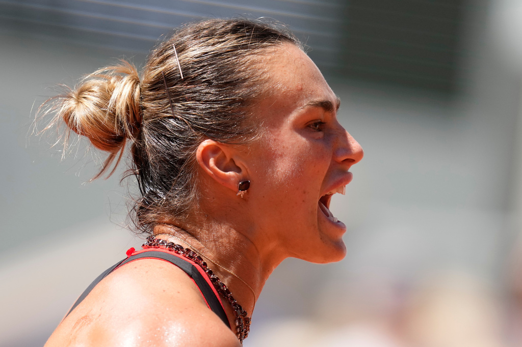 Aryna Sabalenka of Belarus reacts as she plays against Jessica Bouzas Maneiro of Spain during their first round women's singles tennis match at the French Open tennis tournament in Paris, Tuesday, May 26, 2026. (AP Photo/Christophe Ena)