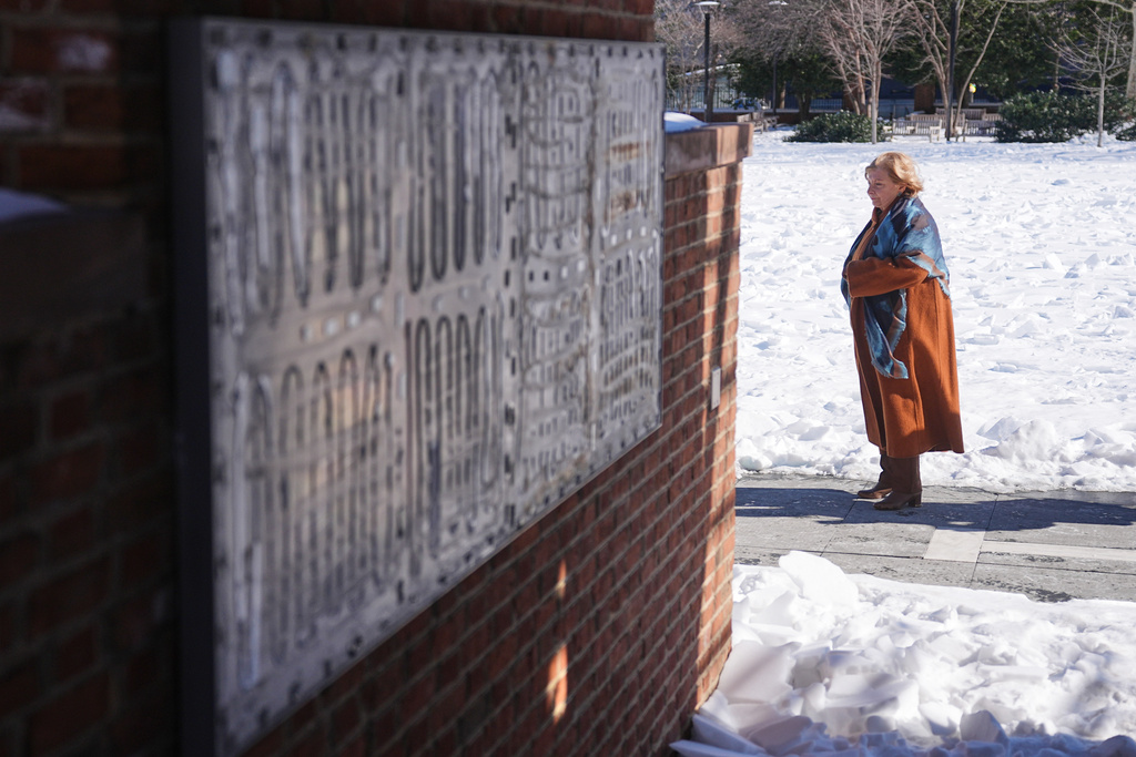 U.S. District Judge Cynthia Rufe inspects the location of the now removed explanatory panels that were part of an exhibit on slavery at President's House Site in Philadelphia, Monday, Feb. 2, 2026. (AP Photo/Matt Rourke)