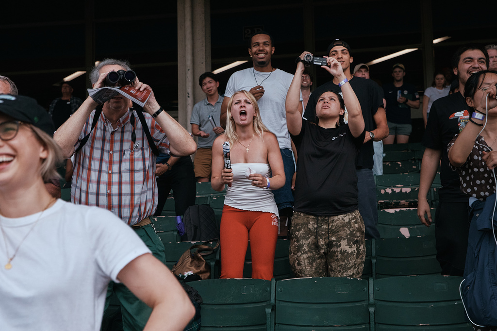 People watch a race at Aqueduct Racetrack in the Queens borough of New York, Saturday, June 27, 2026. (AP Photo/Andres Kudacki)