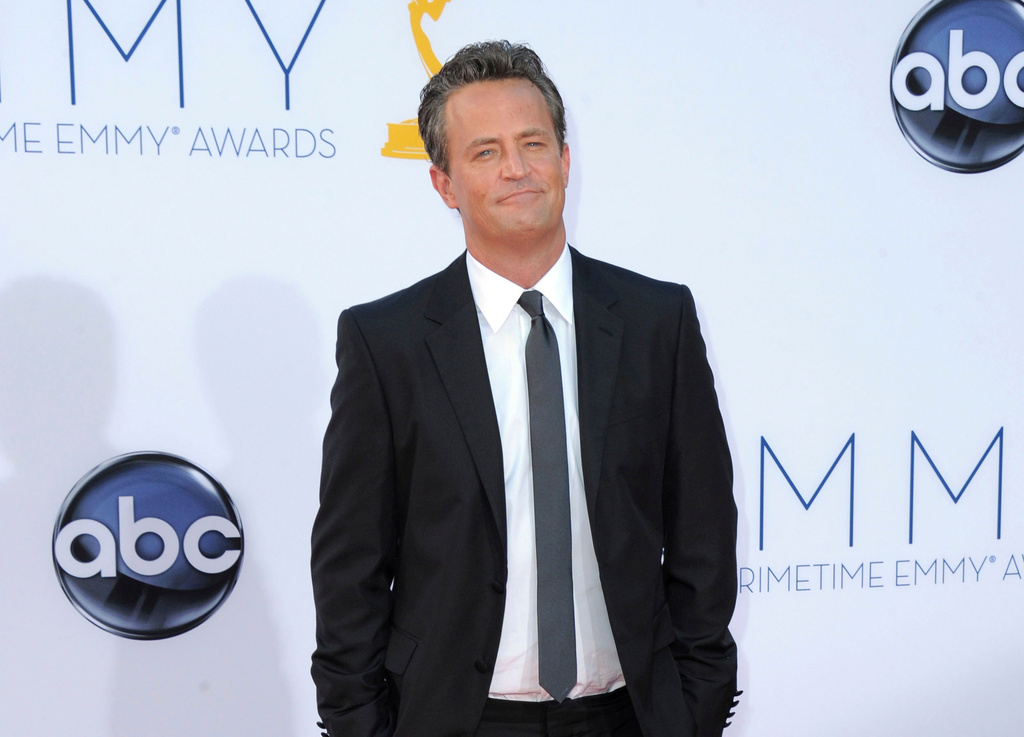 FILE - Actor Matthew Perry arrives at the 64th Primetime Emmy Awards in Los Angeles on Sept. 23, 2012. (Photo by Jordan Strauss/Invision/AP, File)