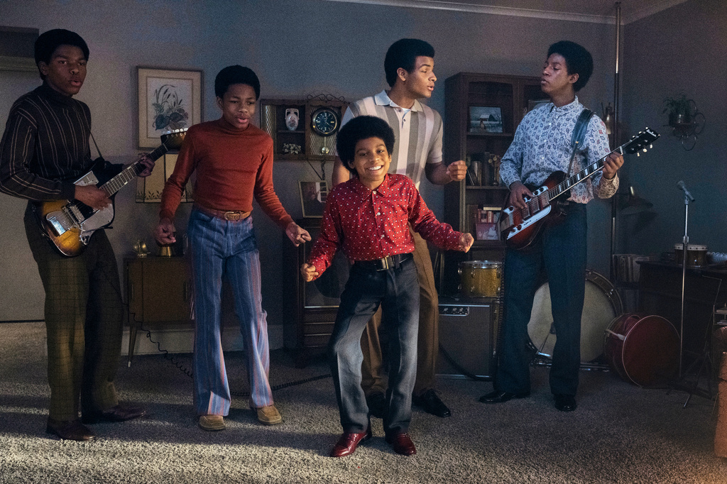 This image released by Lionsgate shows, from left, Judah Edwards as Young Tito, Jaylen Hunter as Young Marlon, Juliano Krue Valdi as Young MJ, Nathaniel McIntyre as Young Jackie and Jayden Harville as Young Jermain in a scene from "Michael." (Glen Wilson/Lionsgate via AP)